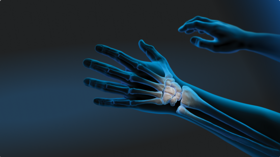 Illustration of human hands and forearms, somewhat transparent and with a blue aura. The bony anatomy of the hand and wrist is in focus.