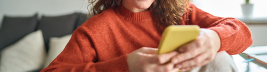 Female looking at phone showing interest